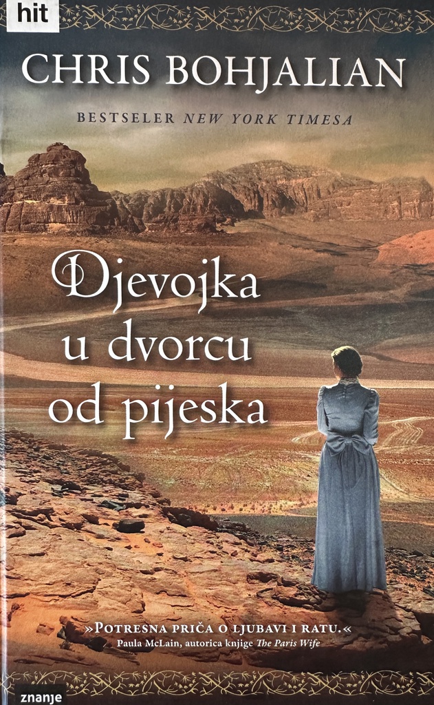 DJEVOJKA U DVORCU OD PIJESKA